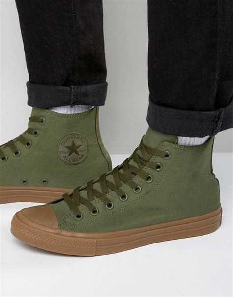 lookastic green sneakers.